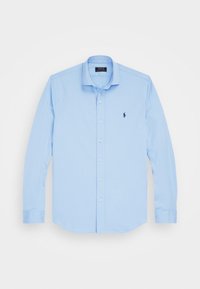 Jasnoniebieska koszula z długim rękawem na guziki, wykonana z bawełny, z ostro zakończonym kołnierzykiem, zapięciem na guziki z przodu oraz granatowym haftowanym logo na piersi.