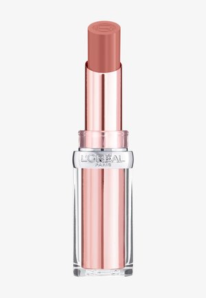 Lipstick tube with a clear base. The outer casing is metallic rose gold, and the bullet is a soft nude pink. Features brand logo on top.