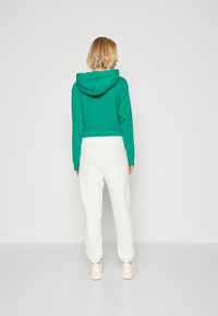 GAP HERITAGE JOGGER - Donji dijelovi trenirke - new off white