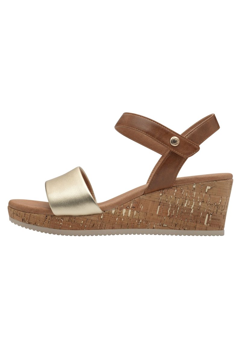 Brune læder wedge sandaler med en skinnende guld frontrem, korktekstureret hæl, justerbar ankelrem og en struktureret sål.