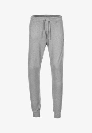 Szare dresy z miękkiej mieszanki bawełny, z elastycznym pasem na sznurki, bocznymi kieszeniami oraz ryflowanymi mankietami przy kostkach.