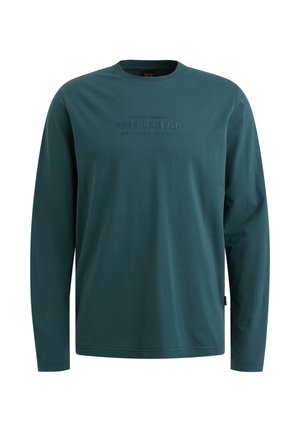 Dlhý rukáv, teal bavlnené tričko s okrúhlym výstrihom a embosovaným textom: "PME LEGEND AMERICAN CLASSIC" na hrudi. Mäkká textúra.