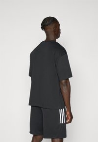 adidas Performance ANTHONY EDWARDS ANTED GFX - T-shirt print - black