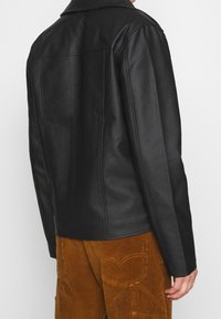 Nominal Veste en similicuir - black