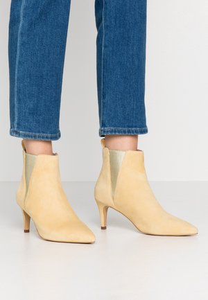 Ankle boots - yellow