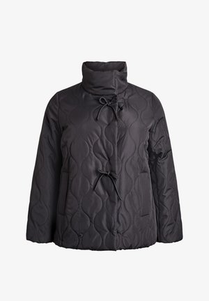 Black quilted jacket featuring a high collar, two front pockets, toggle closures, and a smooth texture with a distinctive wave pattern.