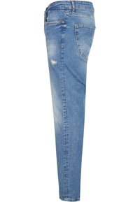 Vaaleansiniset slim fit -farkut, joissa on kevyt kuluminen, kulutettuja yksityiskohtia ja perinteinen viisi taskua -suunnittelu.