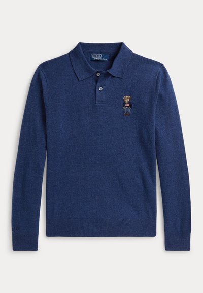 Navy blue long-sleeve polo shirt with two buttons and embroidered bear wearing a sweater and jeans on the left chest.
