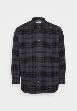 Košulja dugih rukava s gumbima u mornarsko plavom tartanu, s svijetlosmešnim naglascima, kragnom s gumbima i opuštenim krojem. Napravljena od mekanog materijala.