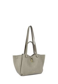 Borsa tote in pelle grigia con due manici lunghi, bordi arrotondati e dettaglio hardware color oro sul davanti. Design strutturato e spazioso.