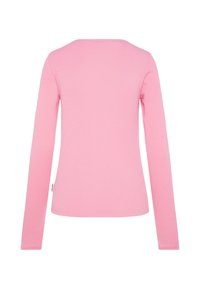 Langarmshirt aus weichem, rosa Rippstoff, mit rundem Halsausschnitt und schlanker Passform ohne zusätzliche Details oder Muster.