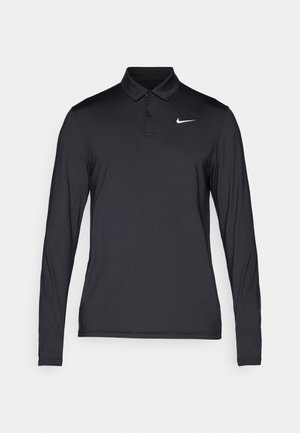 Svart långärmad polotröja i slät tyg, med klassisk krage och en vit Nike-logotyp på vänster bröst.