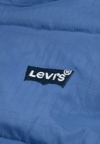 Levi's® BATWING DIRECT PUFFER UNISEX - Strukirani kaput - star sapphire