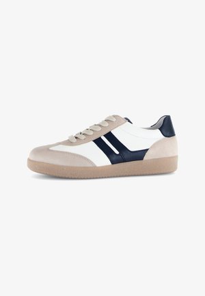 Sneakers featuring a mix of beige suede and white leather, with navy stripes. Rubber sole and rounded toe design, light brown outsole.