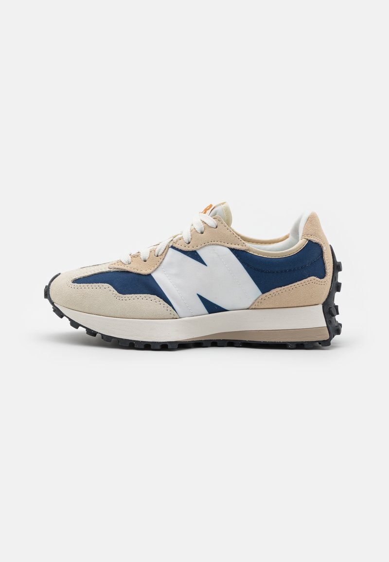Beige and blue athletic sneaker with white laces, white midsole, black rugged outsole, and large white logo on the side.