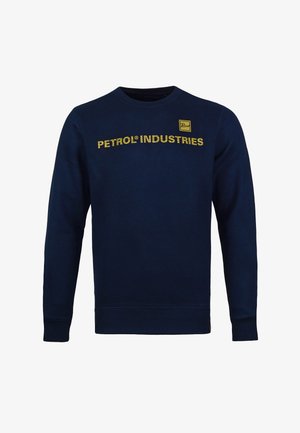 Sweatshirt bleu marine à manches longues, col rond, avec "PETROL® INDUSTRIES" en jaune sur la poitrine, et un petit logo sur le coin supérieur gauche.