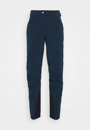 Navy trousers with a sleek design, made of lightweight fabric. Features reinforced black sections at the lower legs and a front snap closure.