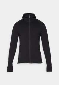 Black zip-up hoodie with a high collar, long sleeves, and side pockets. Made of a soft, stretchable fabric. Flat seams and minimal design details.