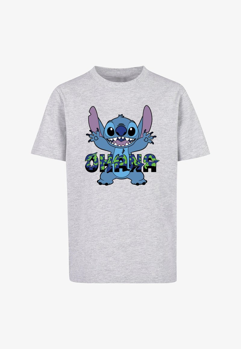 Hallikas puuvillane T-särk, millel on sinine joonistuskarakter suurte kõrvade ja laia naeratusega, all printimiseks "OHANA" värvilistes tähtedes.