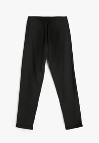 Schwarze Jogginghosen mit einem elastischen Bund, zwei Gesäßtaschen und umgeschlagenen Bündchen. Hergestellt aus weichem, glattem Stoff mit einer lockeren Passform.