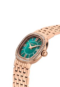 Rozā zelta pulkstenis ar ovālu seju, tirkīza ciparnīcu, romiešu skaitļiem un kristāla akcentiem ap risinu; metāla saite.