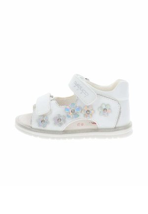 Sandalo bianco per bambini con due cinturini regolabili e applicazioni floreali iridescenti decorative lungo il lato.