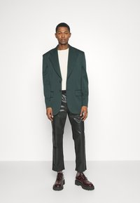 MCM COLLECTION PANTS - Vaqueros rectos - black