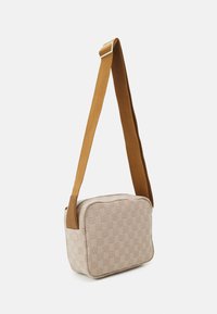 Jordan JAM MONOGRAM MINI MESSENGER BAG  - Taška cez plece - coconut milk