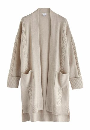 Beżowy sweter na drutach z luźnym krojem, otwartym przodem, wzorem warkocza na rękawach oraz dwiema przednimi kieszeniami z prążkowanymi mankietami.