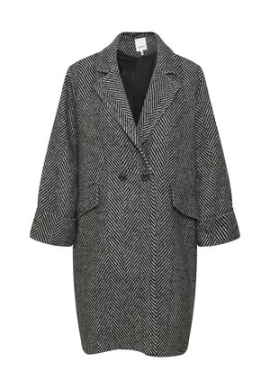 Frakke i sort og hvidt houndstooth-mønster med brede revers, dobbeltradet knaplukning og løse ærmer i elbow-længde.
