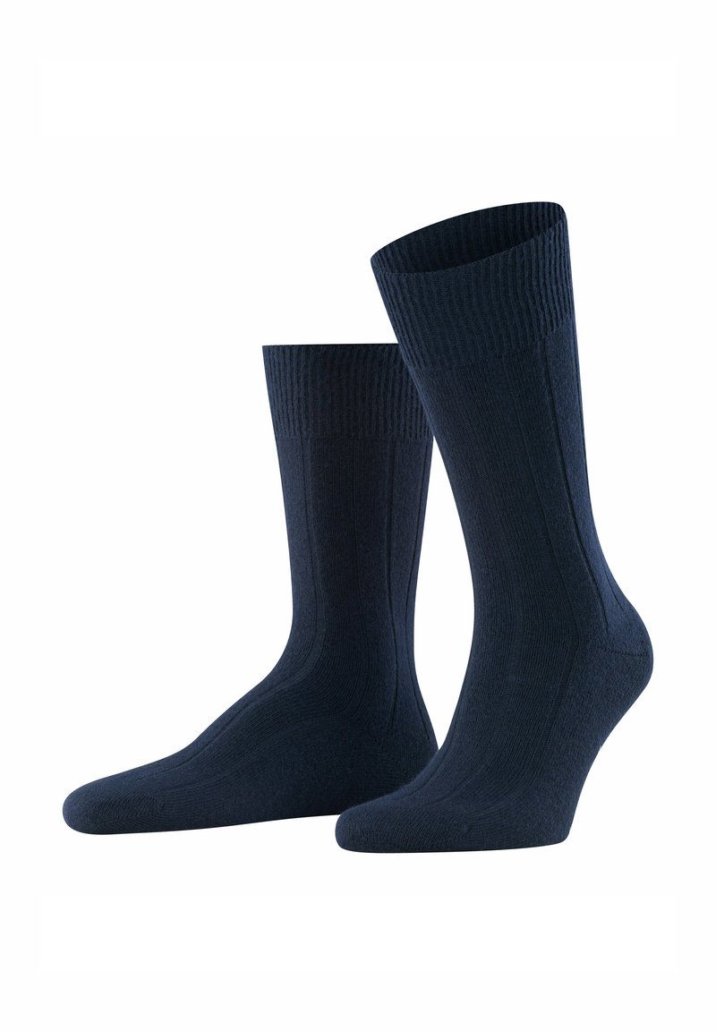 Dunkelblau gefärbte Baumwollmischsocken mit gerippten Bündchen, glatter Textur und verstärktem Zehen- und Fersenbereich für zusätzliche Haltbarkeit.
