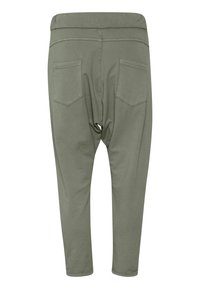 Pantalons en jersey de coton doux, vert olive, avec une coupe ample, dotés d'une taille haute et de deux poches arrière. Design notable avec un entrejambe bas.