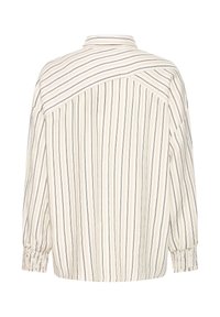 Krēmkrāsas krekls ar garām piedurknēm, ar vertikālām un diagonālām plānām melnām un bēšām svītrām, ar savāktām aprocēm un brīva silueta piegriezumu.