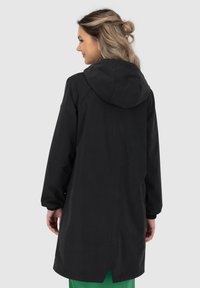 alife & kickin Regenjas - black