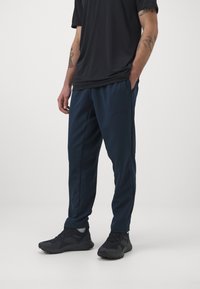 Adidas Terrex MT  - Donji dijelovi trenirke - aurora ink