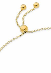 Goldkette Schmuck mit drei kugelförmigen Akzenten, einem zarten Gliederdesign und einer polierten Oberfläche. Minimalistisch und elegant.