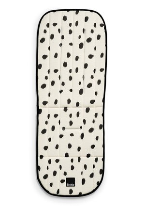 Rivestimento imbottito bianco per passeggino con macchie nere irregolari e un'etichetta nera "Elodie" al centro in basso.