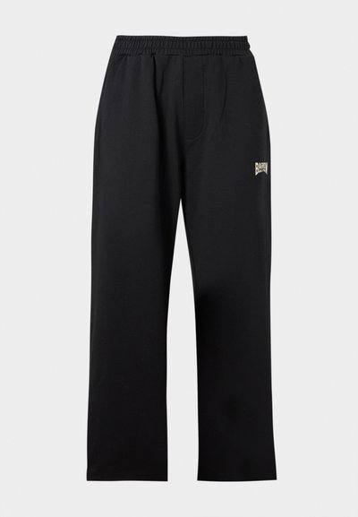 Pantalons en coton noir à coupe décontractée, avec une taille élastique et un petit logo doré à l'avant. Texture lisse, design polyvalent.