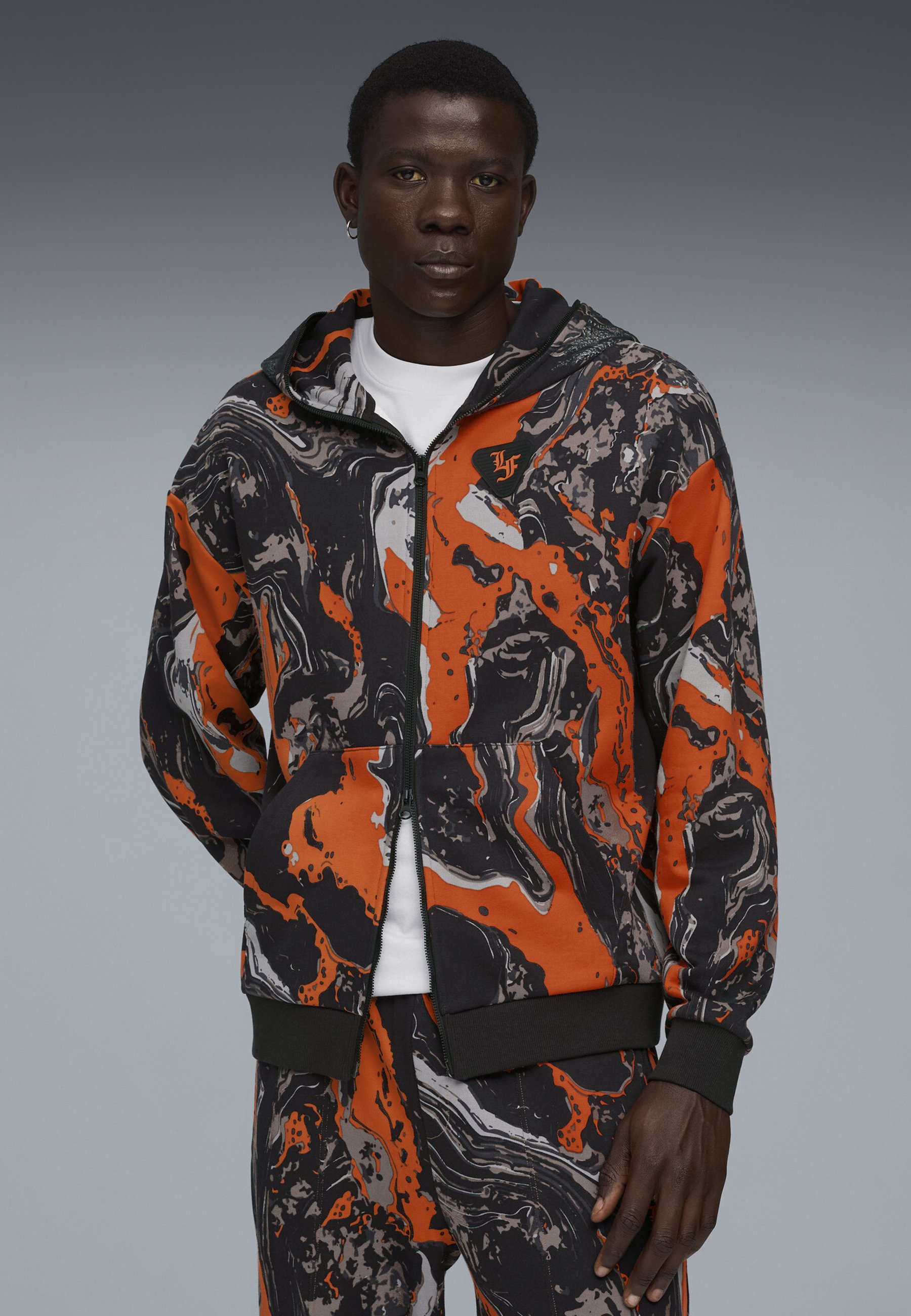 Puma LAFRANCÉ HEEM ERA - Zip-up sweatshirt - orange glo aop/orange Puma LAFRANCÉ HEEM ERA - Zip-up sweatshirt - orange glo aop/orange