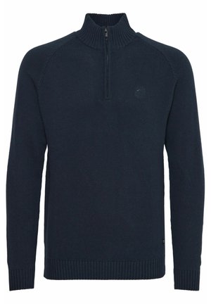 Pullover in maglia blu navy con colletto alto, zip a metà sul davanti, polsini e orlo a coste, caratterizzato da maniche raglan e un piccolo logo sul petto.
