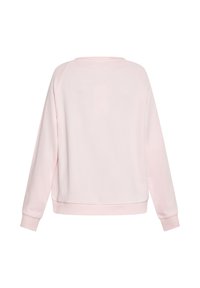 Lichtroze sweatshirt met lange raglanmouwen en ribgebreide cuffs. Heeft een ronde hals en een losse pasvorm. Zachte, textuur biedende stof.