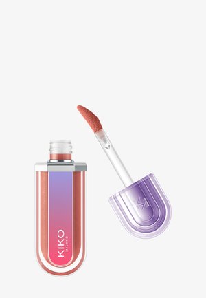 Contenant de gloss à lèvres avec étiquette dégradée rose et bouchon argenté, accompagné d'un applicateur incliné avec gloss mauve sur la pointe en éponge.