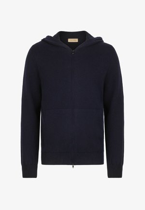 Granatowa rozpinana bluza z miękkiego materiału, z przednią kieszenią i ściągaczami na mankietach. Projekt zawiera kaptur oraz czysty, minimalistyczny wygląd.