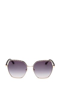 Gafas de sol hexagonales con lentes morados degradados, detalles en dorado y patillas negras. Soporte transparente en el interior del armazón para mayor comodidad.