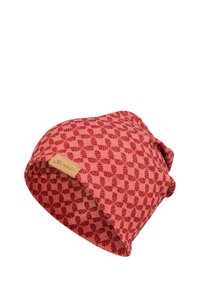Red patterned beanie made from soft fabric, featuring a textured design and a small leather tag with the brand name.