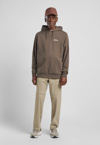 Jack Wolfskin STORM - Pet - dark rust