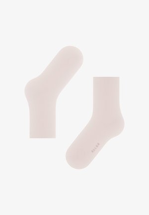 Lichtroze enkelsokken gemaakt van gladde stof, met een eenvoudig ontwerp zonder patronen en subtiele branding op de zool.