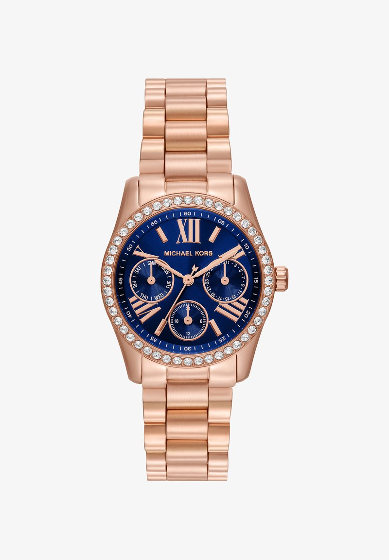 Roségoldene Michael Kors Armbanduhr mit blauem Zifferblatt, Kristall-Lünette, römischen Zahlen, drei Unterzifferblättern und Gliederarmband.