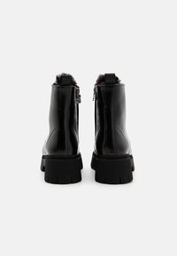HUGO Stivaletti con plateau - black