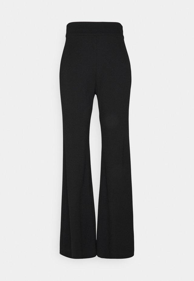SIBEL - Trousers - black